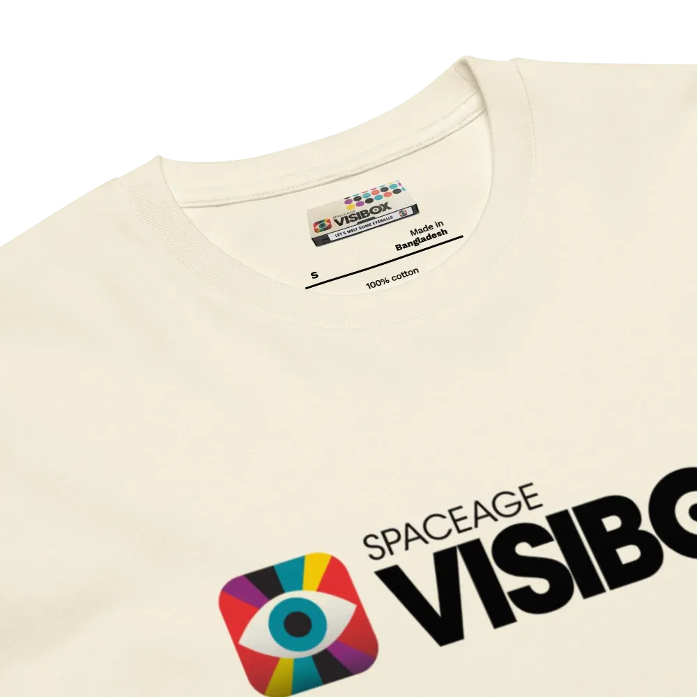 Close crop of the cream tee's collar, showing the printed neck label: a dot-grid band above the Visibox logo