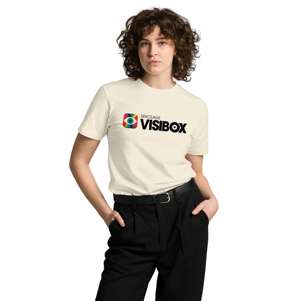 Front view of the natural cream Visibox tee, worn, with the full-color eye mark and black Visibox logo across the chest