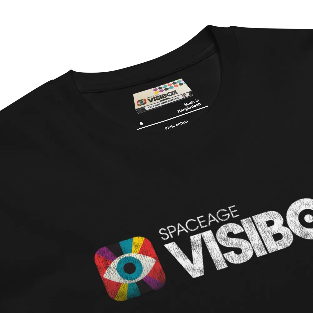 Close crop of the relic'd print on a black tee, the Visibox logo cracked and faded across the chest